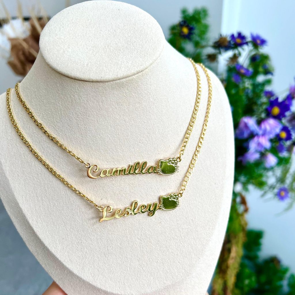 Gold name pendant 